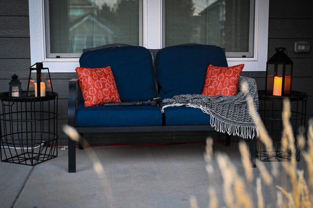 Fall porch with seating and candles