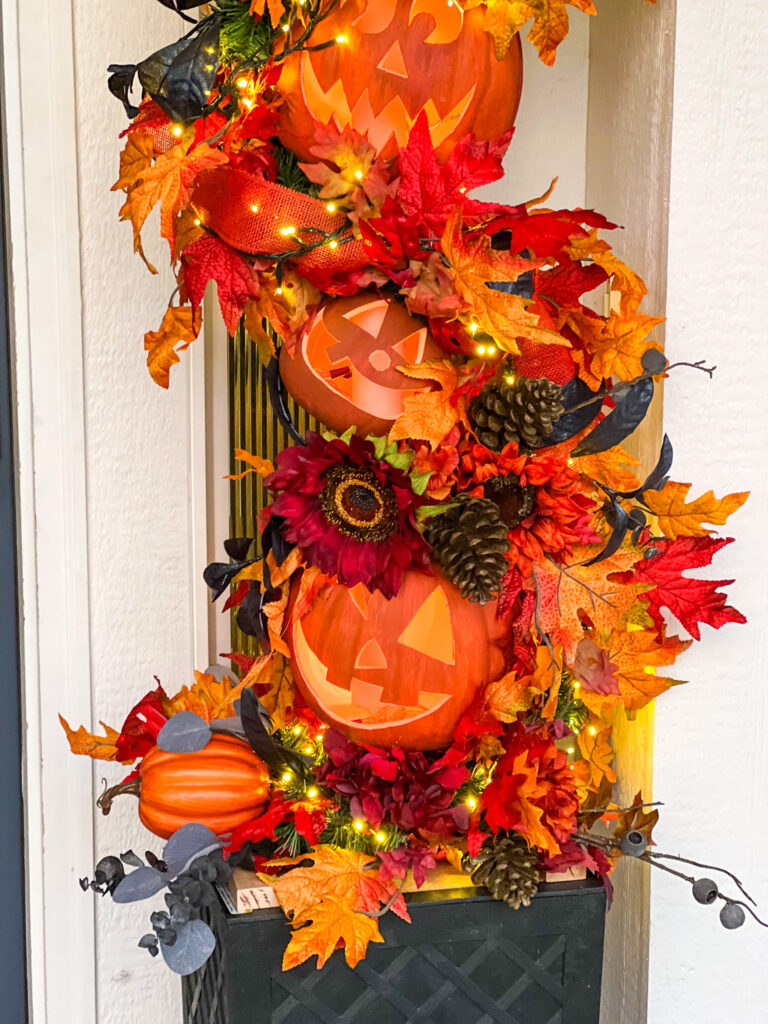 Fall leaves, flowers and pumpkins in fall garland